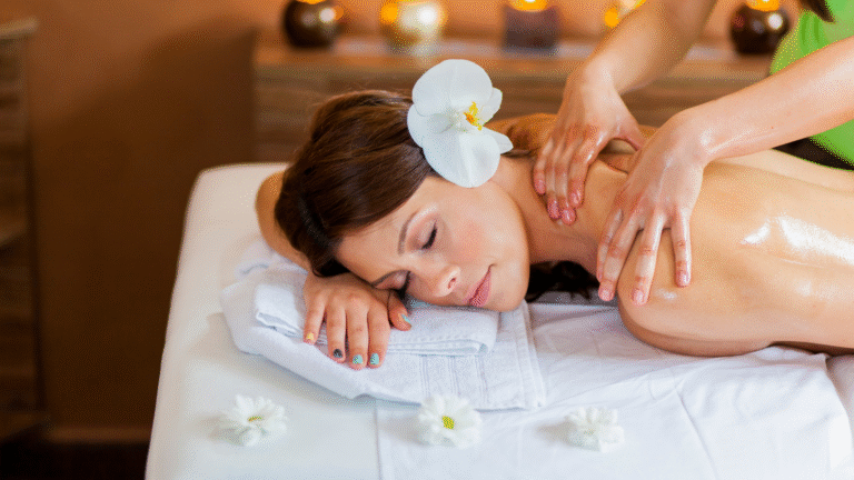 Client enjoying a soothing massage at Hamilton Massage Therapy Clinic, promoting relaxation and wellness in a serene spa setting